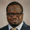 Portrait of Jide Tinubu, MD