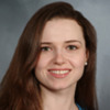 Portrait of Kira Minkis, MD, PHD